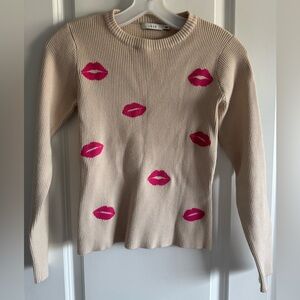 Lush Cream Ribbed Crew Sweater with Pink Lip Motif
